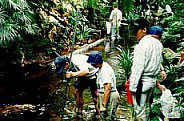 1996 Expedition Team Members Studying Water Velocity. Photo Credit By S.Yorath